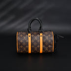 Louis Vuitton Keepall Bandoulière 50 – Monogram Canvas with Neon Orange Trim